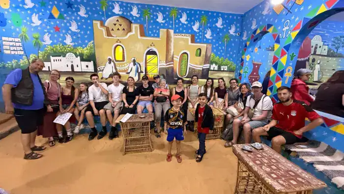 Travel group enjoying an authentic Aswan cultural experience