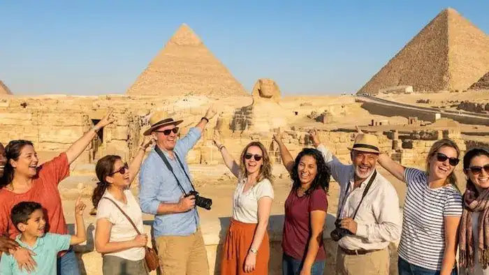 Travel group visiting the Giza Pyramids in Egypt