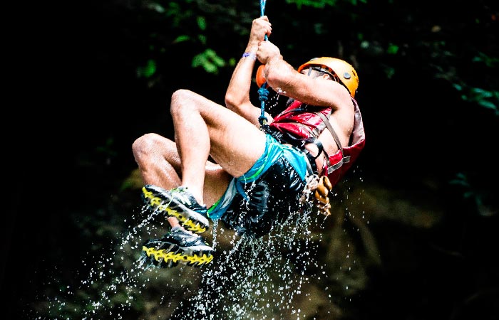 Tourists enjoying the ultimate One Day Adventure Pass at Hacienda Guachipelin in Guanacaste, Costa Rica.