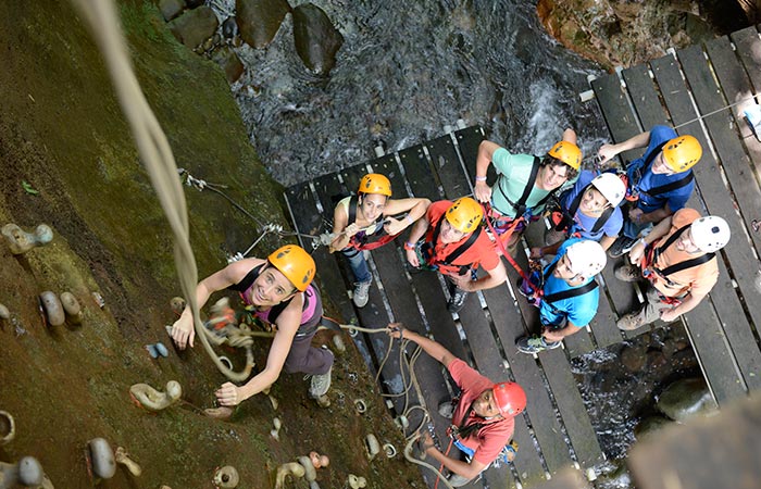 Tourists enjoying the ultimate One Day Adventure Pass at Hacienda Guachipelin in Guanacaste, Costa Rica.