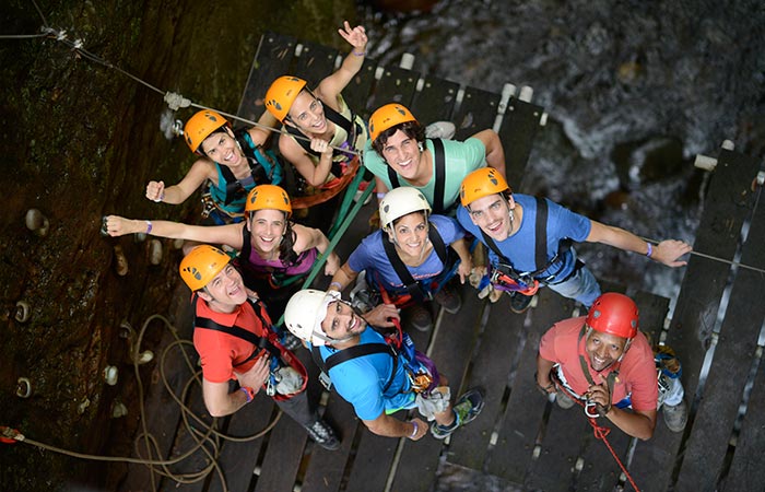 Tourists enjoying the ultimate One Day Adventure Pass at Hacienda Guachipelin in Guanacaste, Costa Rica.