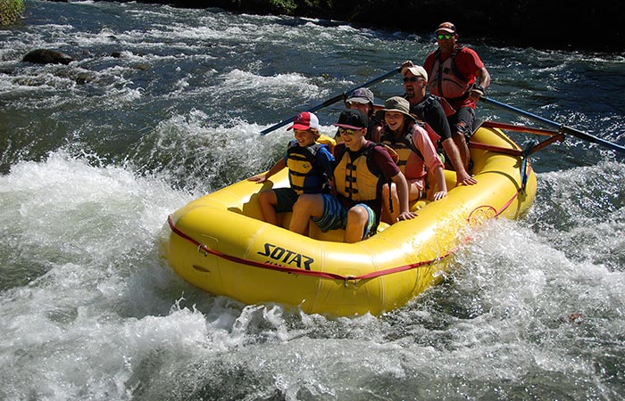 Tourists enjoying the ultimate One Day Adventure Pass at Hacienda Guachipelin in Guanacaste, Costa Rica.