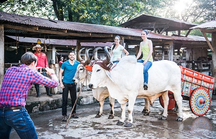 Tourists enjoying the ultimate One Day Adventure Pass at Hacienda Guachipelin in Guanacaste, Costa Rica.