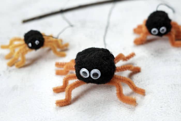 pom pom and pipe cleaner spiders