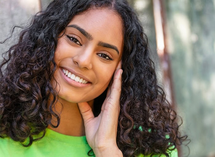 A young woman with a healthy smile