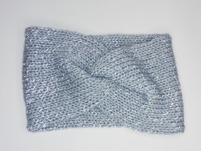 Pannband i ljusblå reflex