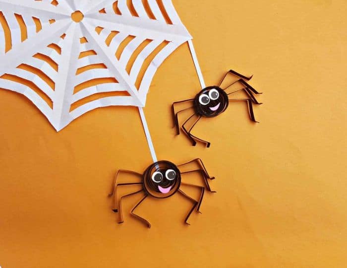 quilled paper spiders with paper web