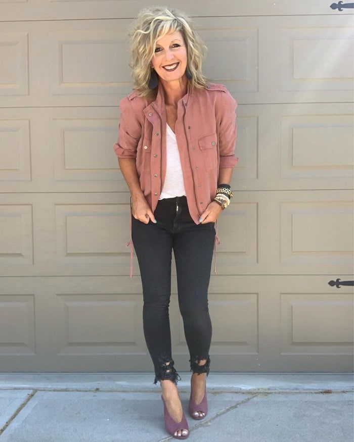 Melanie wearing a tee, jacket, ripped jeans and booties | 40plusstyle.com
