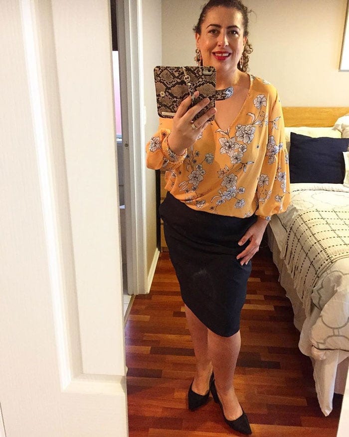 Fee wearing low heel shoes with her pencil skirt and blouse | 40plusstyle.com