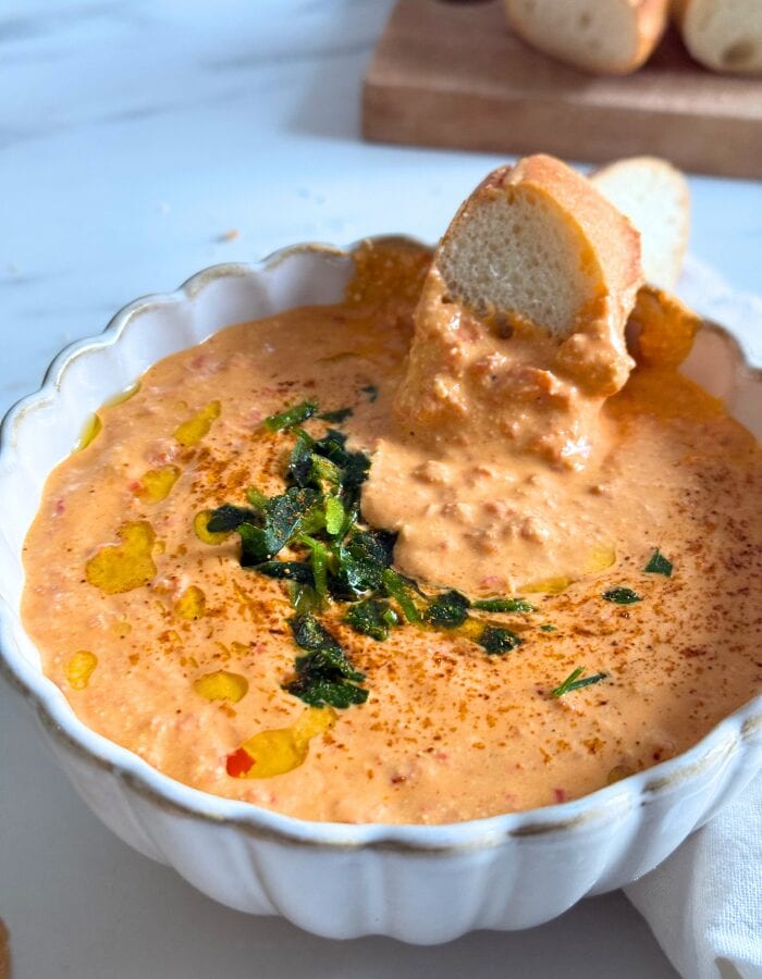 Feta Paprika Dip - Easy & Quick Dip Recipe 7 close up paprika dip in a bowl with bread