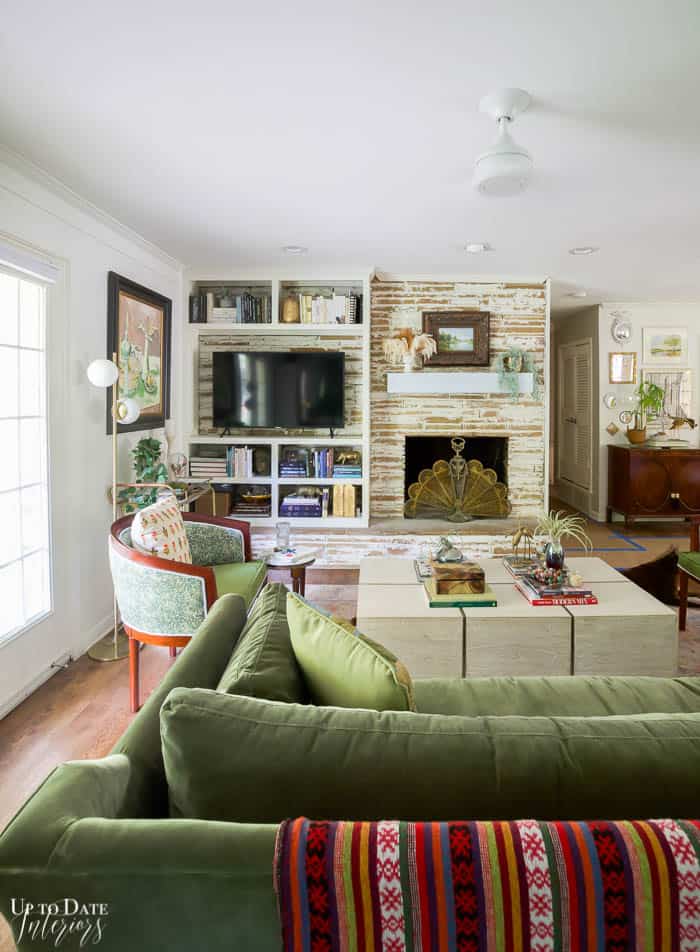 Living Room with Green Velvet Sofa and German Smear Fireplace