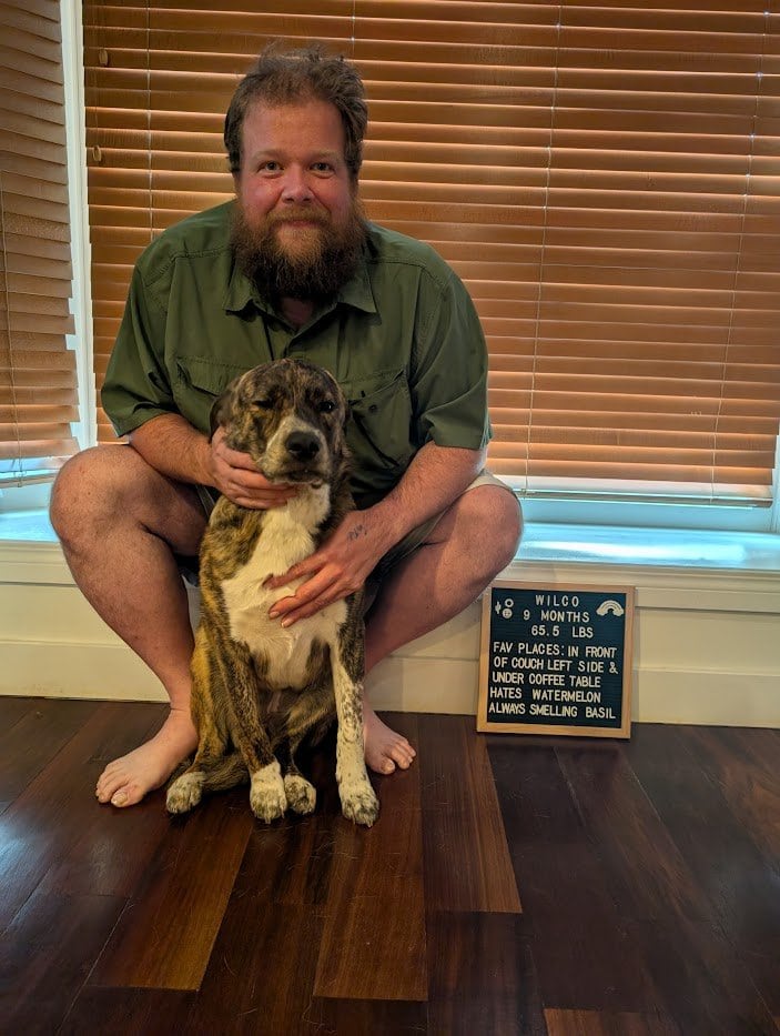 A photo of Kevin Duska and his dog Wilco at the age of 9 months.