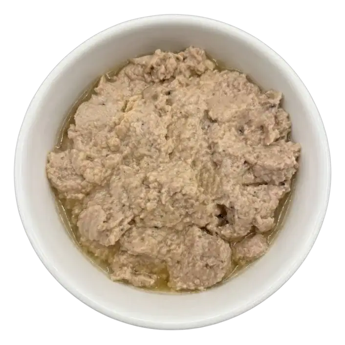 Pat&eacute; Zen monoproteico de salm&oacute;n para perros servido en un bol, textura del producto
