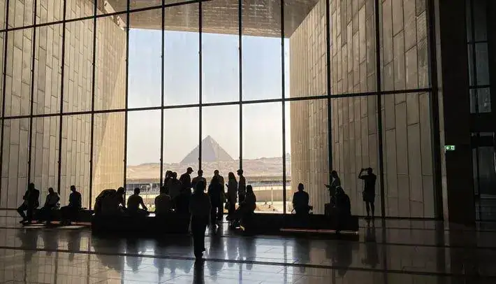 Giza Pyramid seen through a large museum window