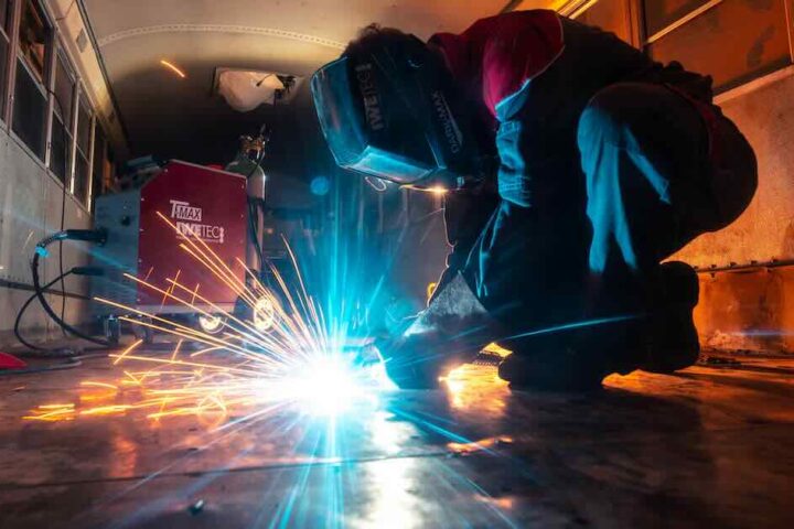 welder in industrial setting