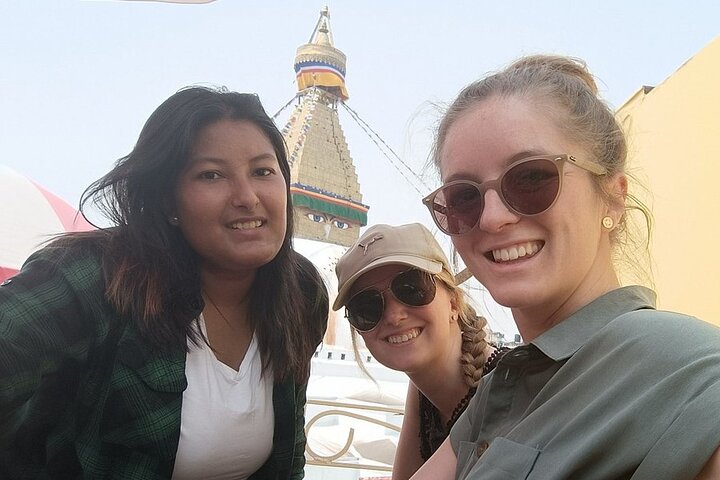 Tour guide Shreya with travelers during Amazing Kathmandu walking tour with 5-star reviews