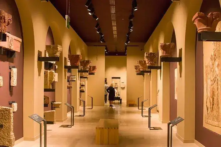 Interior gallery displaying pottery and artefacts in Aswan