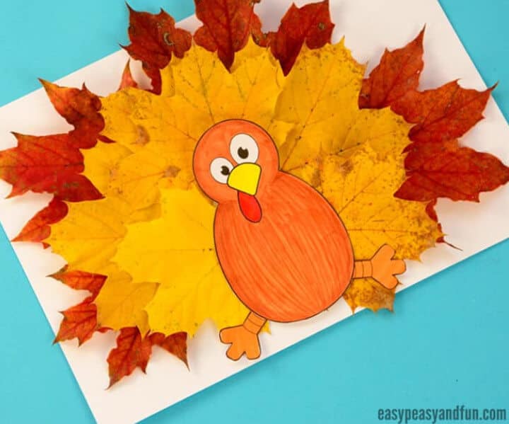 cute fall turkey craft made with orange and red real leaves