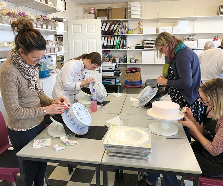 Group working on sides of royal