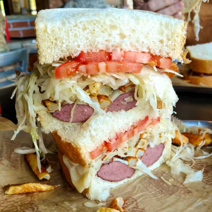 Primanti's sandwich in Pittsburgh with fries and coleslaw, via www.goodfoodstories.com