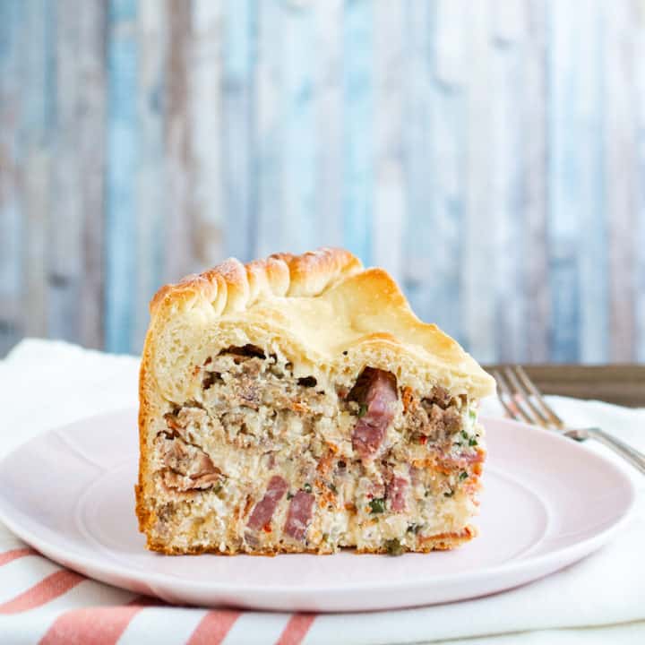 Pizza Chiena or Pizza Gain is an Italian Easter bread absolutely stuffed with sausage, salami, ricotta, and mozzarella cheese. #pizzachiena #pizzagain #italianeasterbread