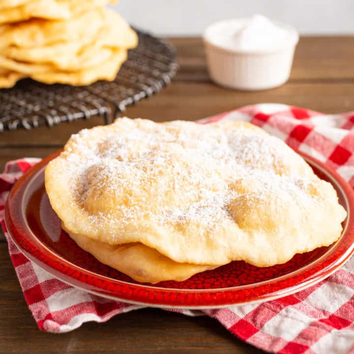 fried dough with powdered sugar