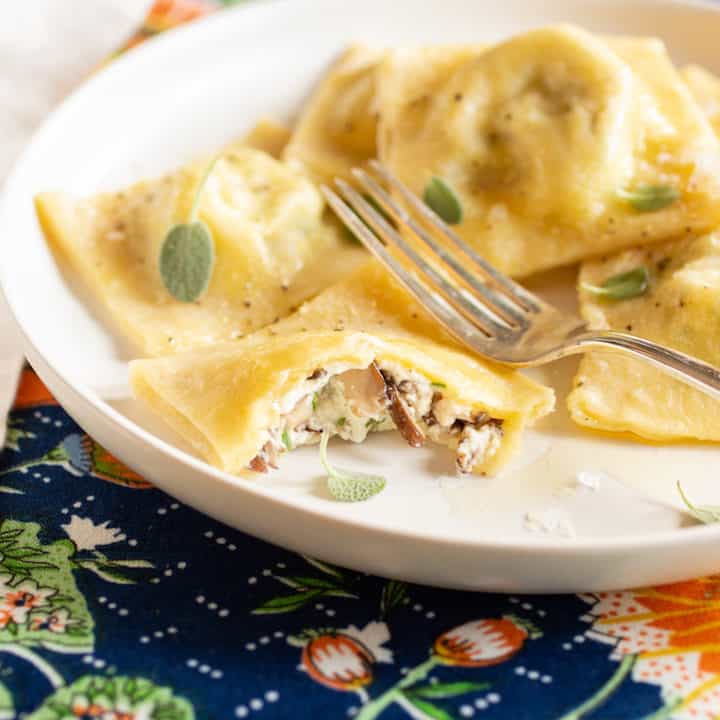 homemade ravioli with mushroom and arugula filling
