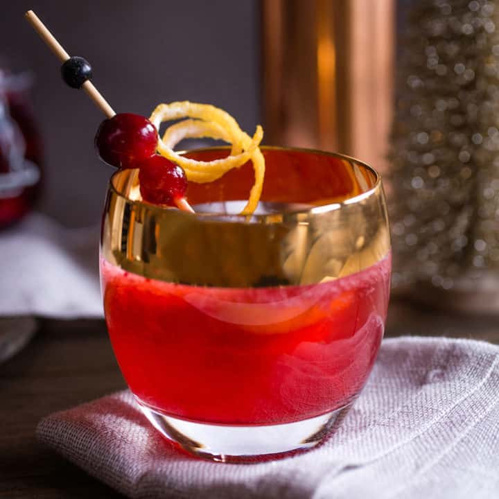 spiced cranberry and bourbon cocktail, via goodfoodstories.com