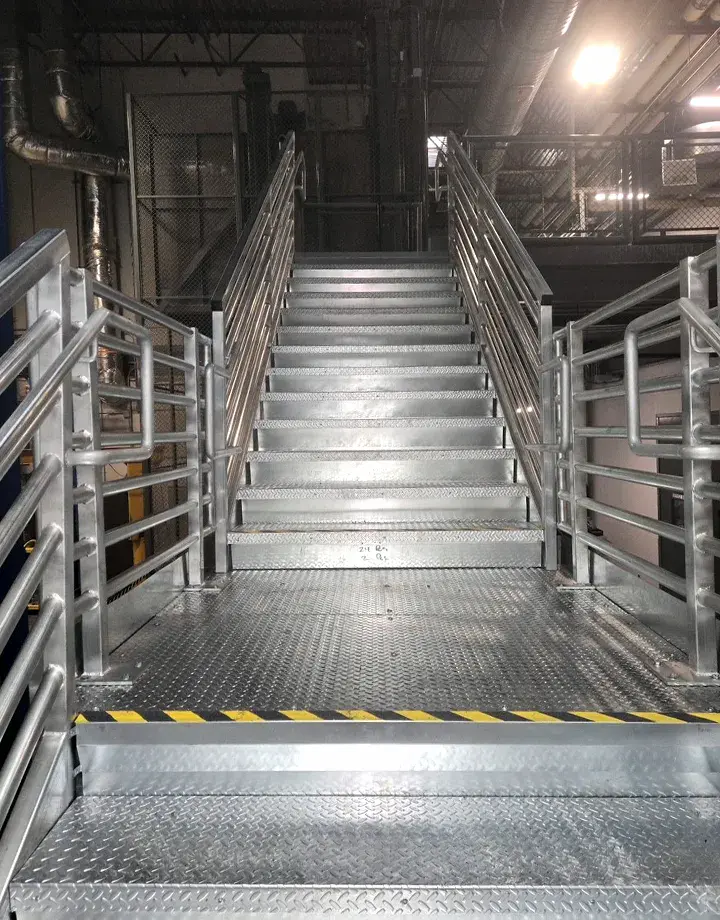 Custom Industrial Steel Stairs by FCP - image shows diamond safety plating and railing