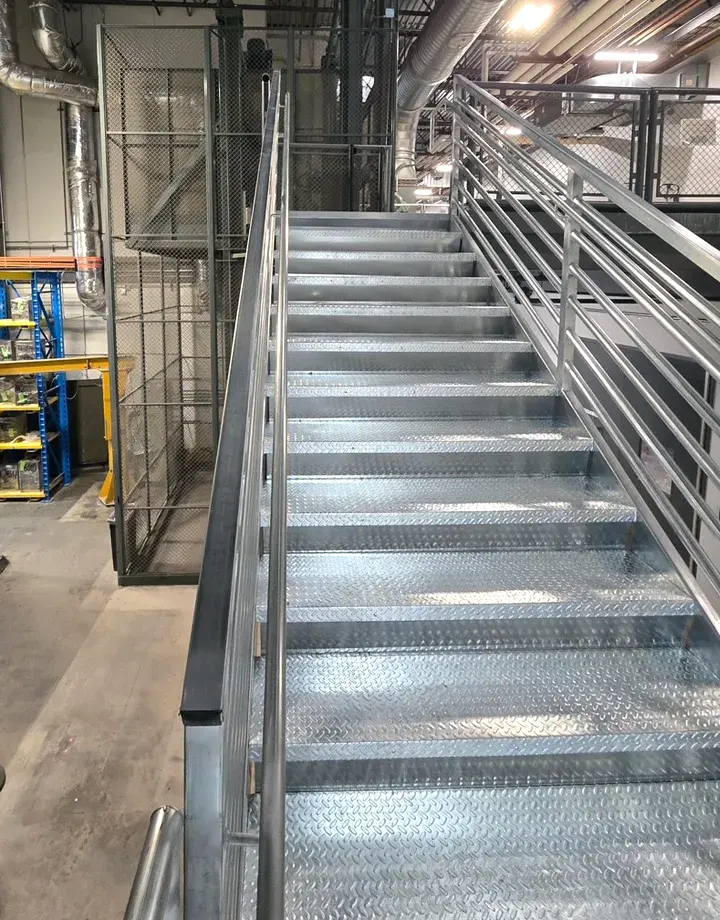 Custom Industrial Steel Stairs by FCP - image shows diamond safety plating stairs