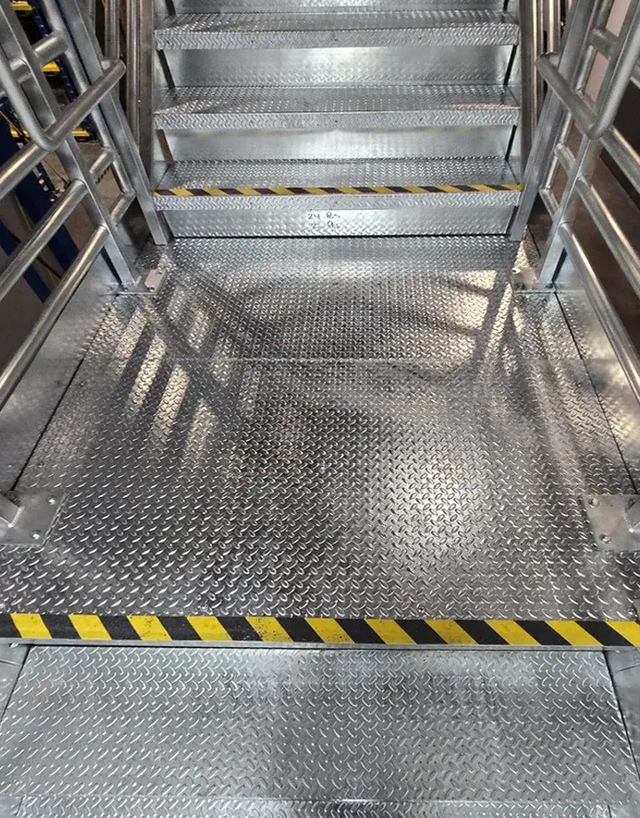 Custom Industrial Steel Stairs by FCP - image shows dimond plating