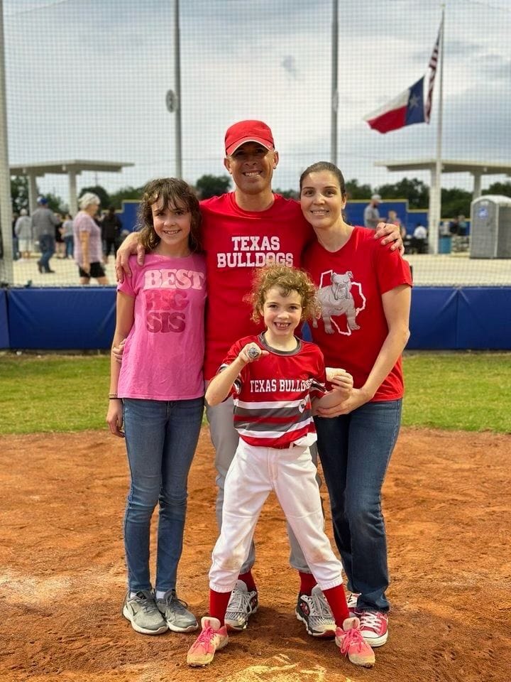 Adam Miller supporting Houston youth softball team during 2023 championship game