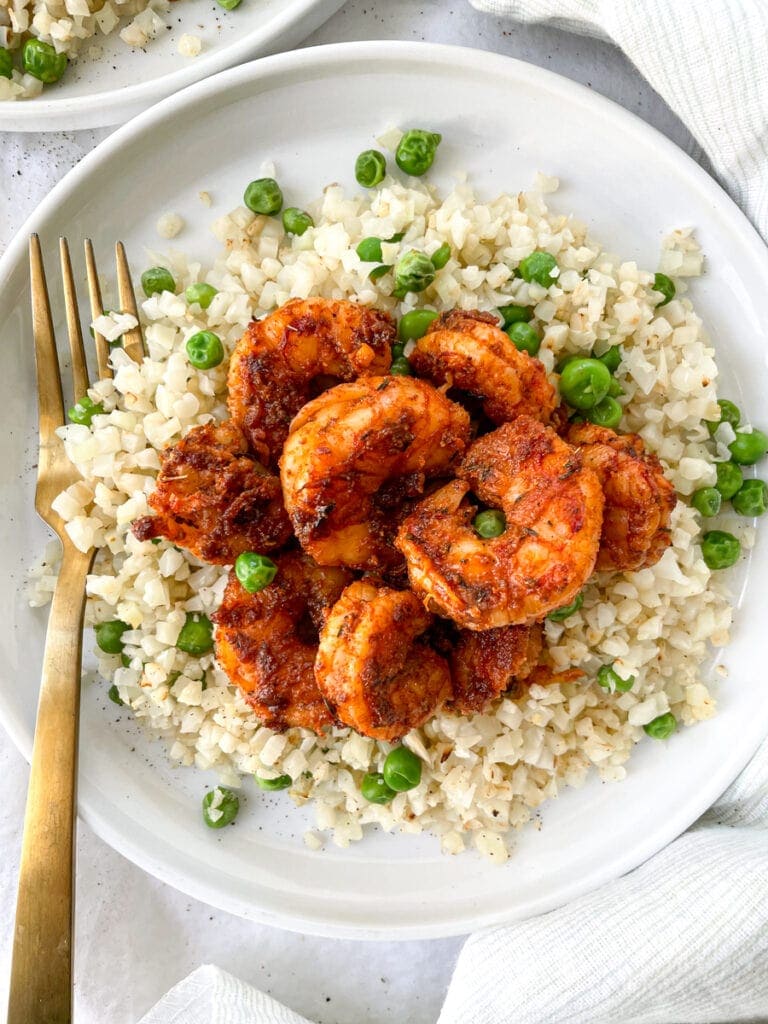 blackened shrimp on a bed of cauliflower rice