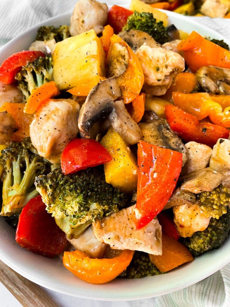hawaiian chicken and veggies on a white plate