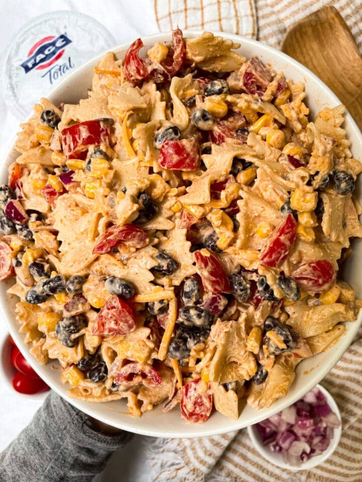 top shot of taco pasta salad made with fage in white bowl