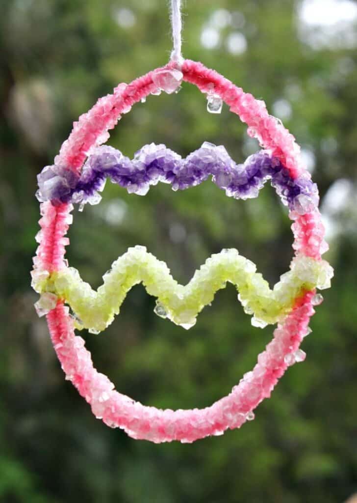 pipe cleaner egg shape covered in Borax crystals