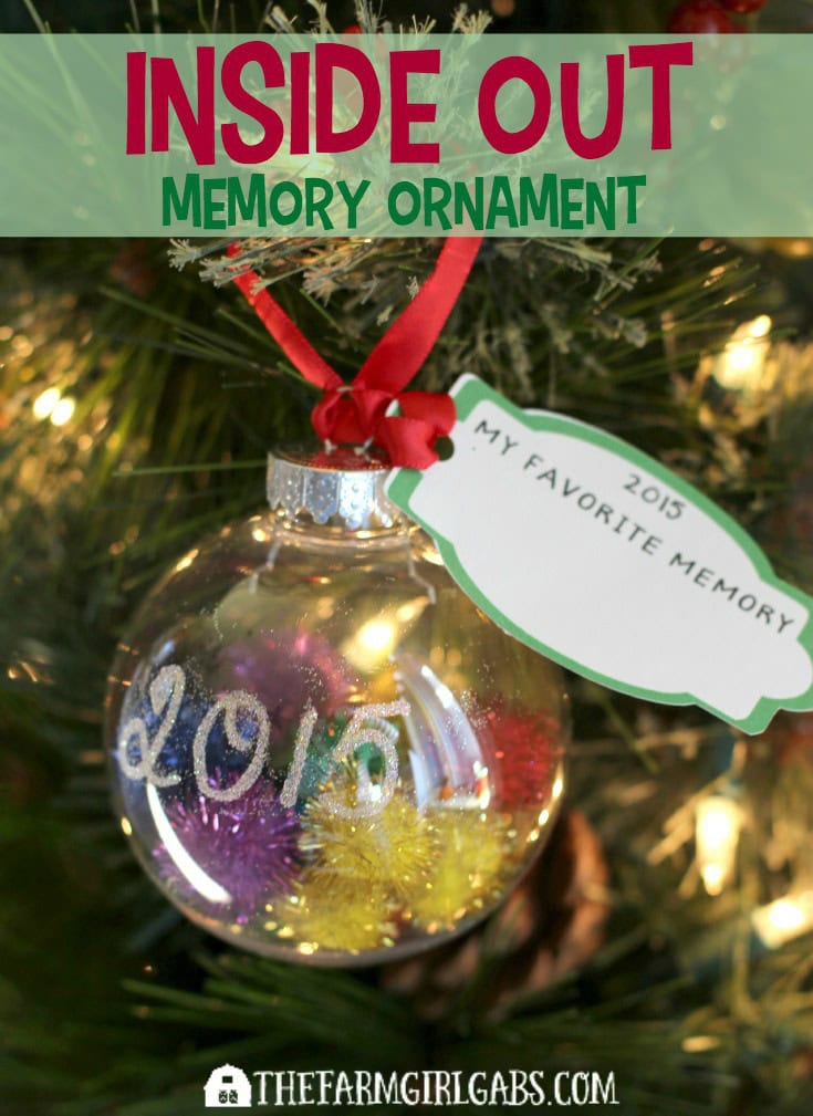 Cherish holiday memories with your kids by making this Inside Out Memory Ornament with them. This simple craft will look perfect hanging on your tree. [Ad] #InsideOutMovieNight