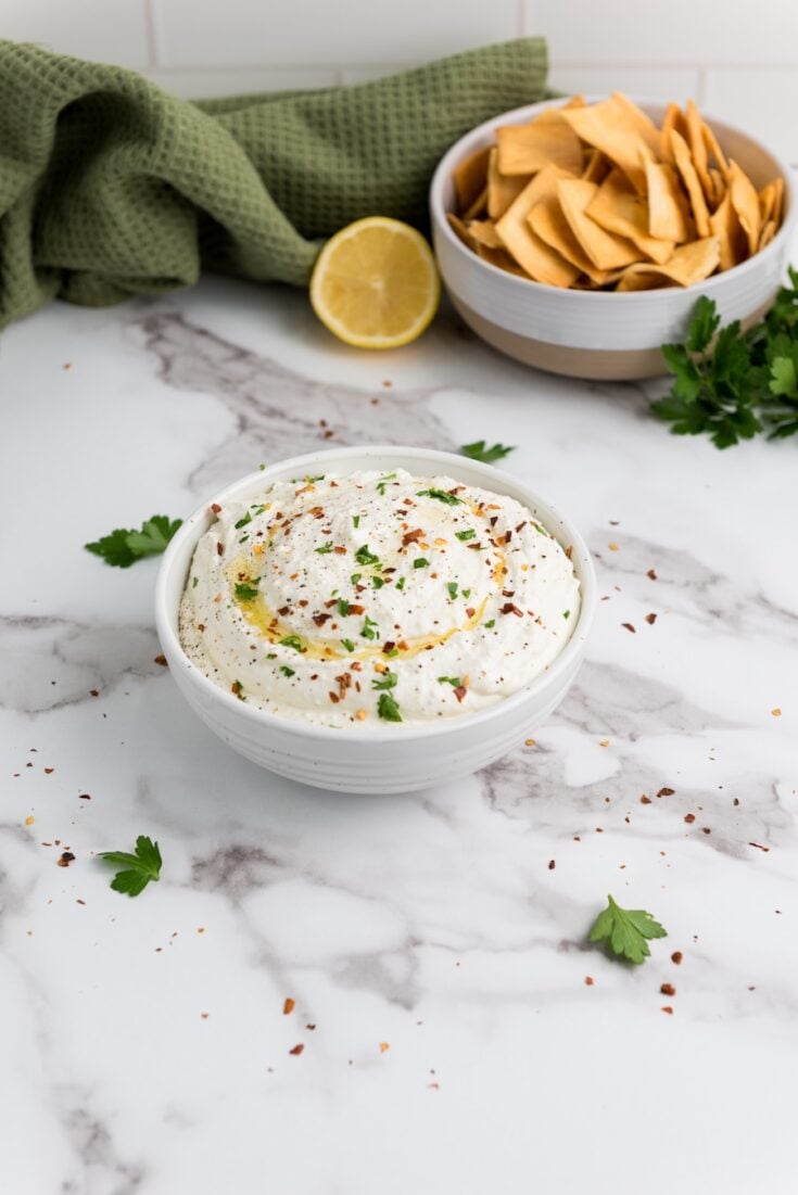 Try this creamy Whipped Feta Dip made with Greek yogurt, olive oil, garlic, and lemon. It's a crowd-pleasing, quick 5-minute appetizer!