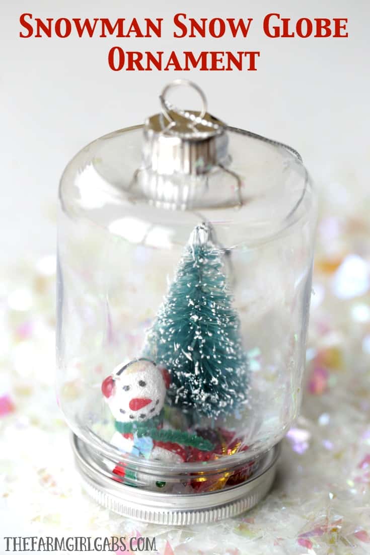 This DIY Snowman Snow Globe Ornament is an easy holiday craft to give along with your family Christmas card.