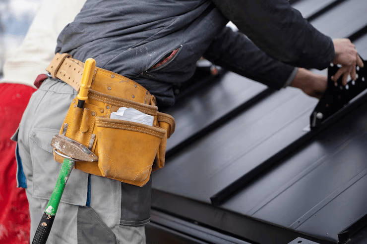 A professional working on a rooftop with accuracy and precision. To get an estimate, get in touch with us today.
