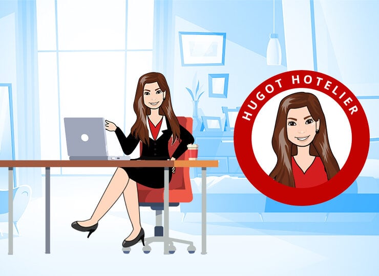 Hugot Hotelier PH avatar say at a desk in front of a silver laptop
