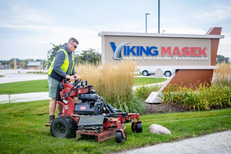 man on lawnmower