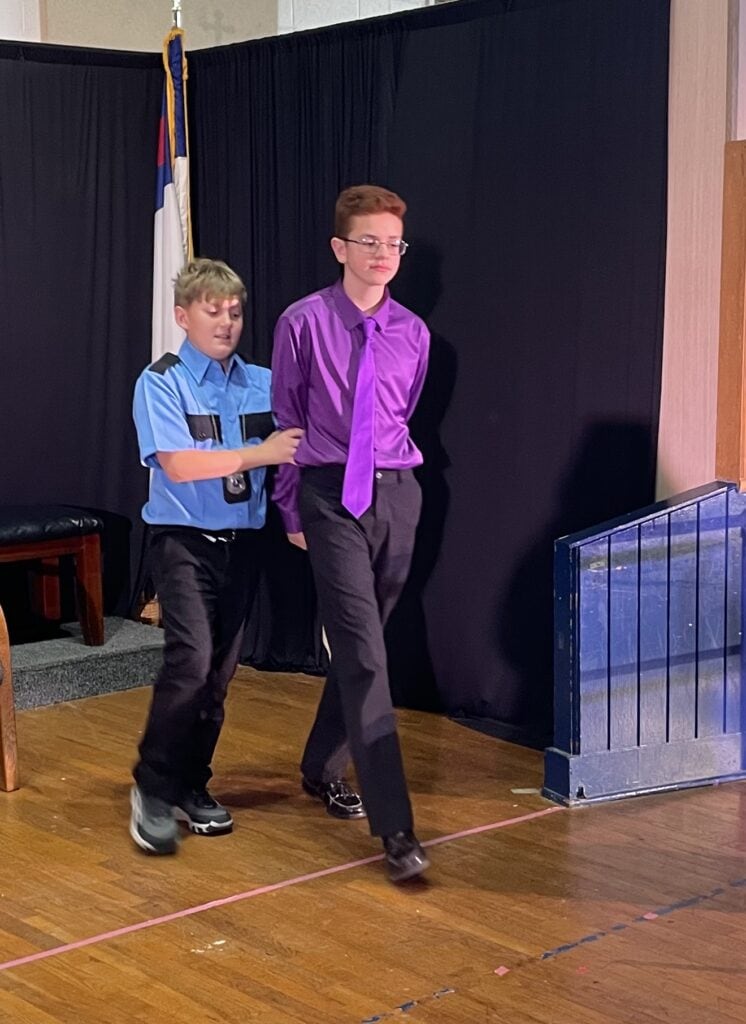 Order in the Court cast members at Martin Luther School