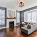 Living Room with dark Hardwood Floors and minimalist staging