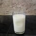 A glass tumbler filled with the drink