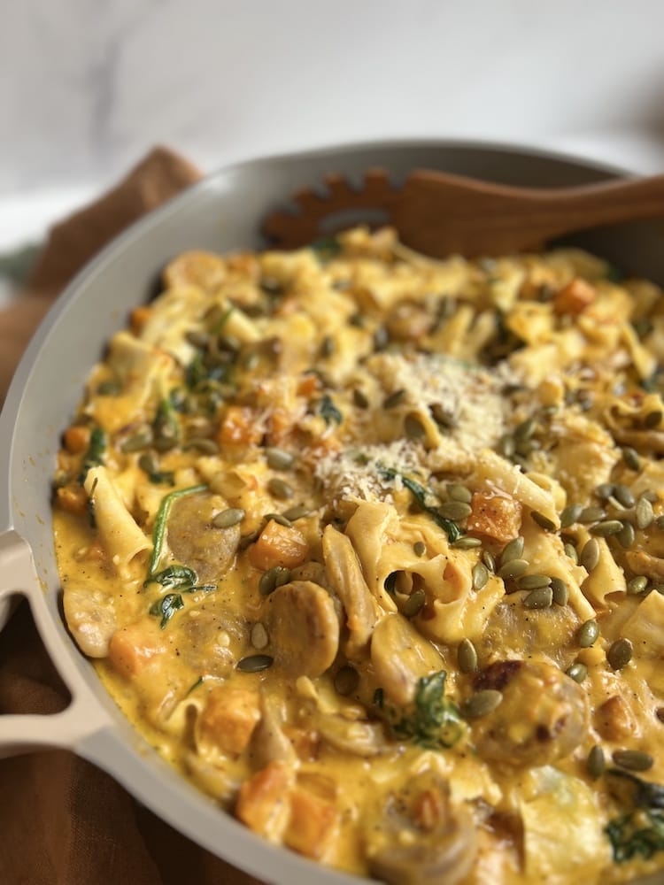 Creamy Butternut Squash Pasta 1 Creamy Butternut Squash Pasta in a pan with wooden spoon