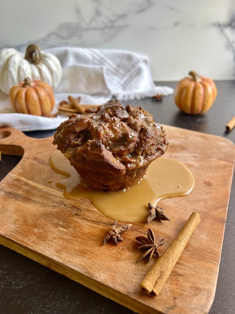 Pumpkin Espresso Bread Pudding 1 Pumpkin Espresso Bread Pudding on a wooden cutting board surrounded by cinnamon sticks and star anise