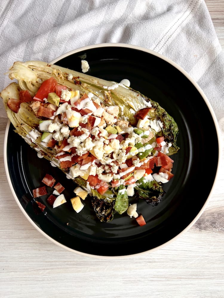 Grilled Romaine Cobb Salad 3 WEB Grilled Romaine Cobb Salad on black plate