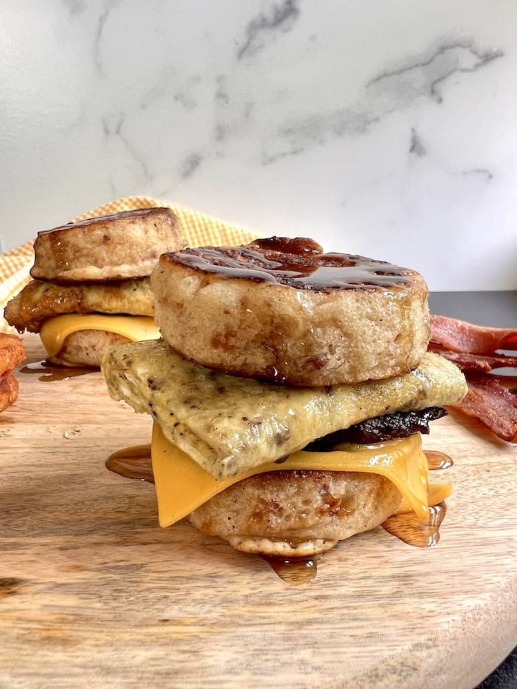 Sausage & Egg Pancake Sandwich 4 WEB Sausage and Egg Pancake Sandwich on a cutting board