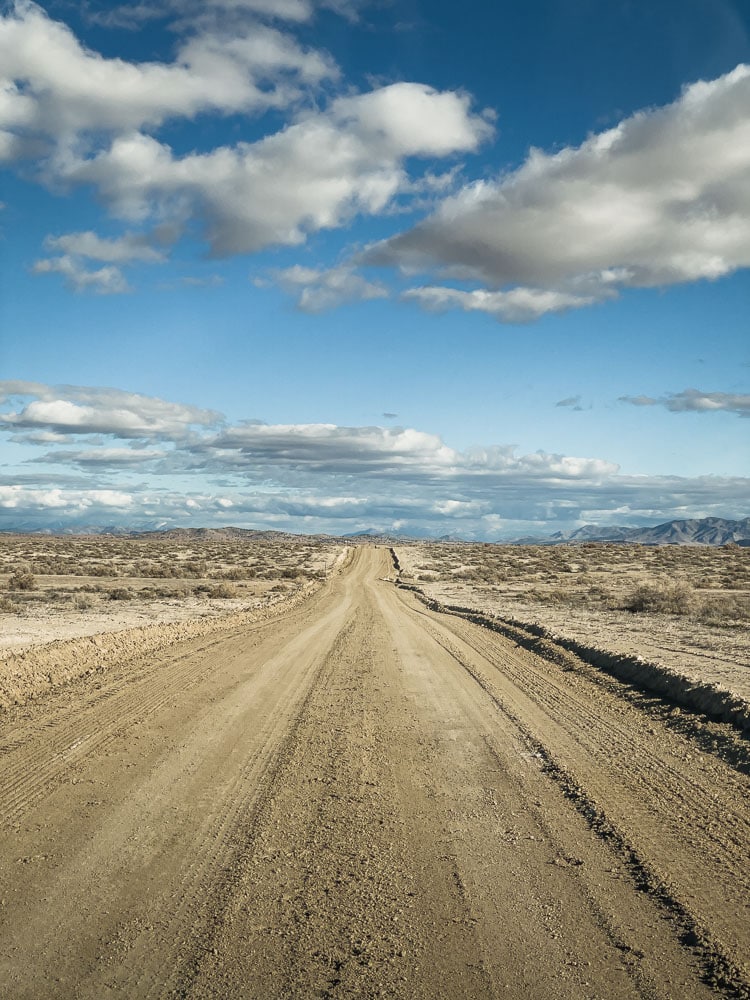 Utah hot springs, dirt road with blue skies, ArboursAbroad